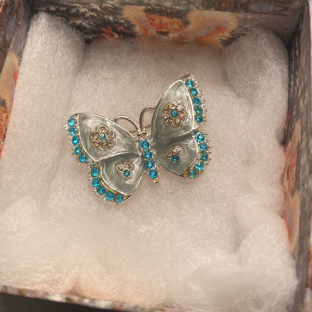 Silver and turquoise butterfly brooch/pin.